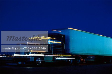 Transport Truck and Light Trails At Night