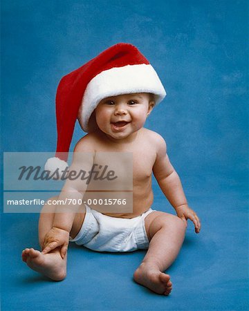 Portrait of Baby Wearing Santa's Cap