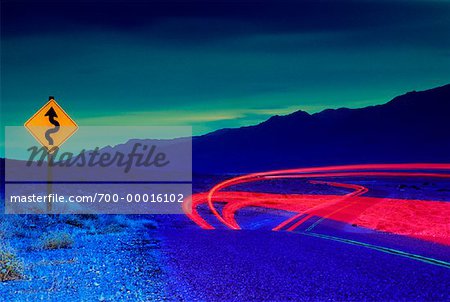 Light Trails on Road at Dusk Death Valley, California, USA