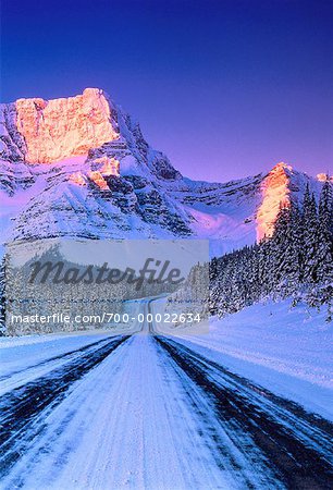 Snow Covered Highway and Mountain at Sunrise, Highway 93 Banff National Park, AB, Canada