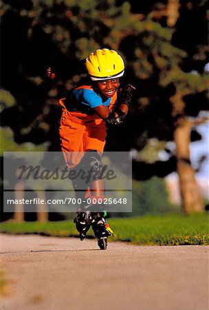 Girl In-Line Skating on Sidewalk