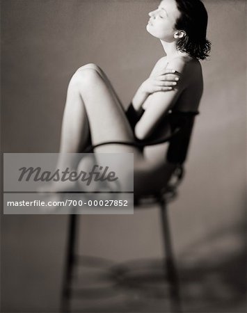 Nude Woman Sitting in Chair