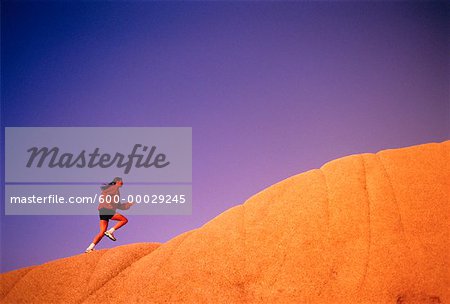Femme Running Up Hill
