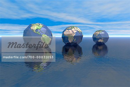 Trois Globes sur eau affichant les Continents du monde