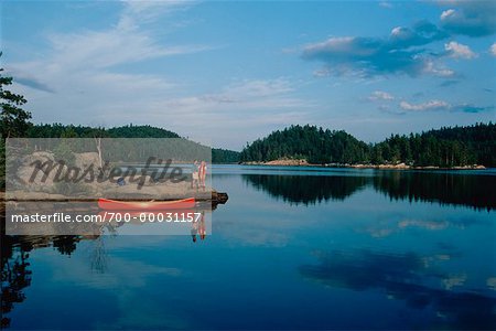 Couple Canoeing Temagami, Ontario, Canada