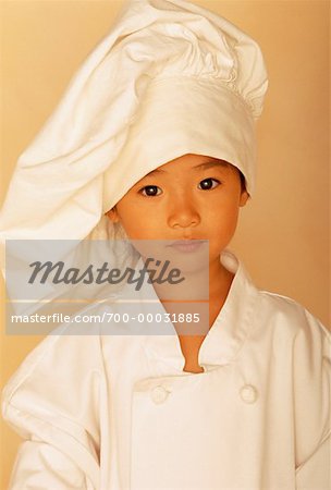 Portrait of Child Wearing Chef's Hat