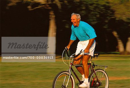 Mature Man Riding Bike