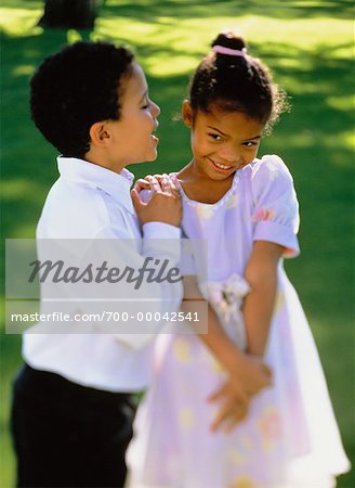 Boy and Girl in Formal Wear Outdoors