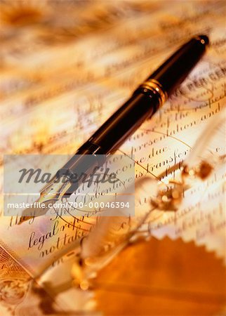 Close-Up of Document, Pen and Eyeglasses