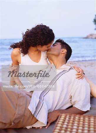 Couple Kissing on Beach