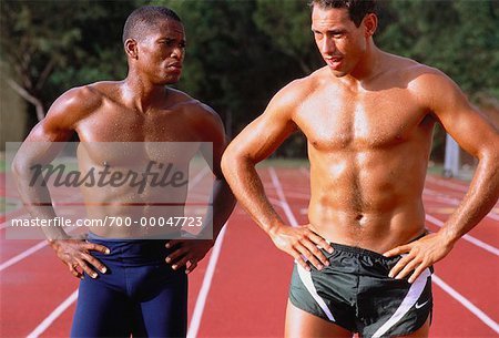 Men Standing on Outdoor Track