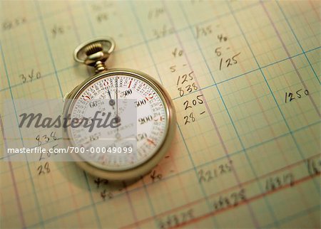 Close-Up of Stopwatch on Ledger