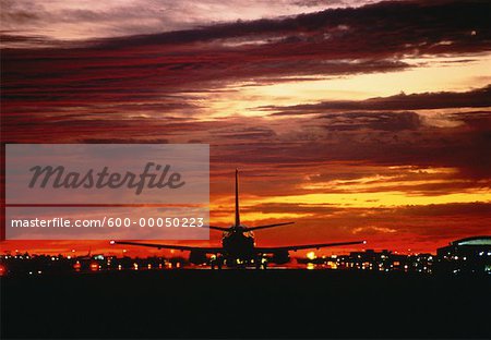 Airplane Taking OFf at Sunset