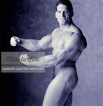 Portrait of Nude Body Builder Posing