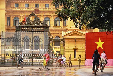 People Riding Bicycles near The President's House, Hanoi, Vietnam