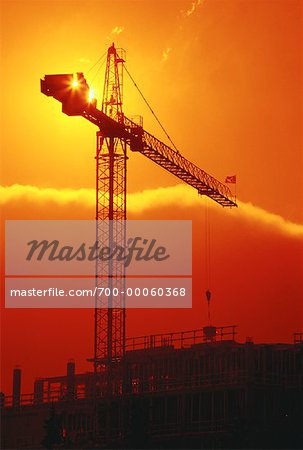Silhouette of Building Construction and Crane at Sunset Calgary, Alberta, Canada
