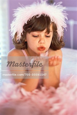 Girl Sitting on Bed, Wearing Ballerina Costume