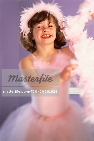 Portrait of Girl Wearing Ballerina Costume and Pink Boa