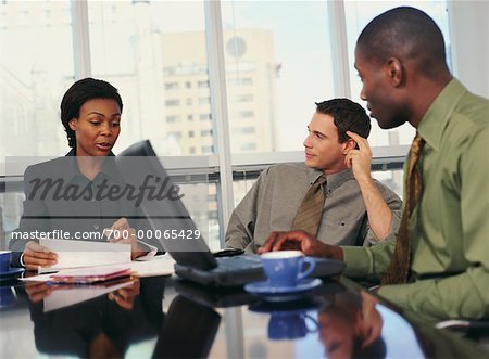 Business People Working in Boardroom