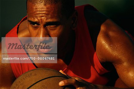 Close-Up of Man Holding Basketball Outdoors