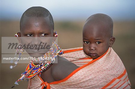 Masai Mother Carrying Child on Back, Kenya, Africa