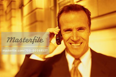 Portrait of Businessman Using Cell Phone Outdoors