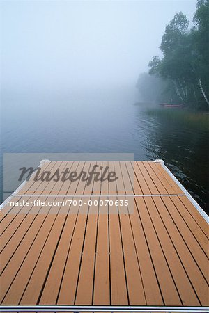 Dock, Lake and Fog Otter Lake, Haliburton, Ontario Canada