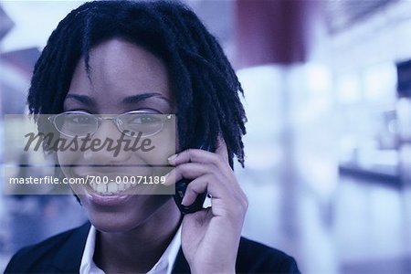 Portrait of Businesswoman Using Cell Phone, Smiling