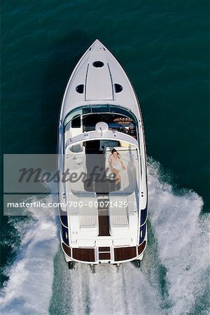 Overhead View of Couple in Cruising Boat Miami, Florida, USA