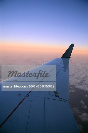 Airplane Wing and Sunset