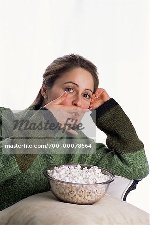 Portrait of Woman Eating Bowl Of Popcorn