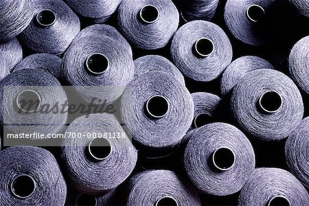 Close-Up of Spools in Textile Manufacturing Facility