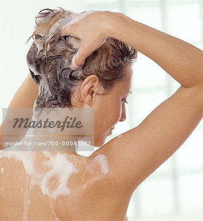 Back View of Woman Washing Hair