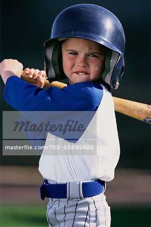 Portrait of Boy Wearing Baseball Uniform and Helmet, Holding Bat