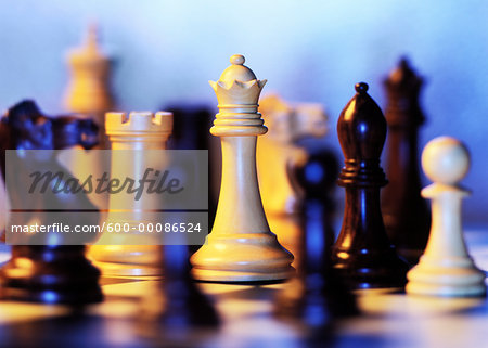 Close-Up of Chess Pieces on Board