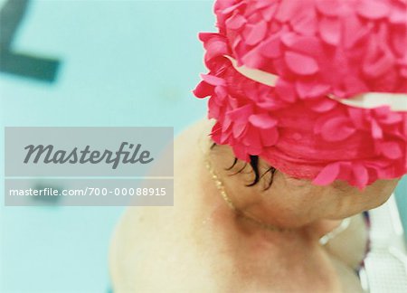 Mature Woman in Pink Bathing Cap