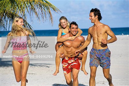 Young Men and Women on Beach