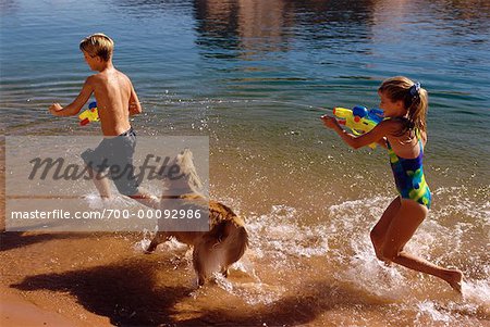 Children and Dog in Lake
