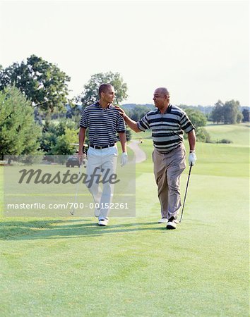 Father and Son Golfing