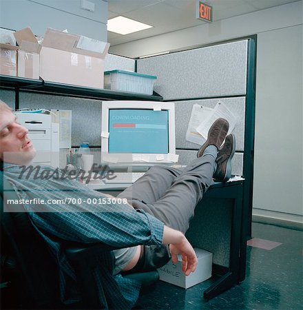 Man Sleeping at Desk