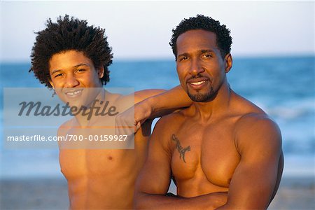 Portrait of Father and Son at Beach