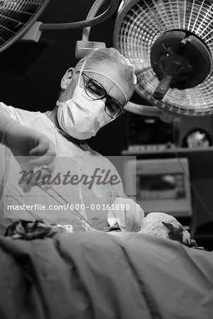 Doctor Performing Surgery Doctor Performing Surgery