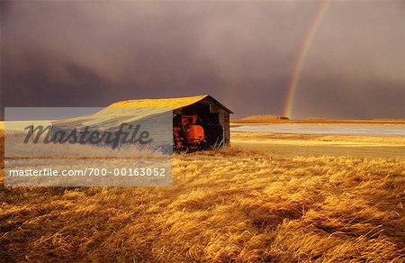 Cabane sur la Prairie avec arc-en-ciel