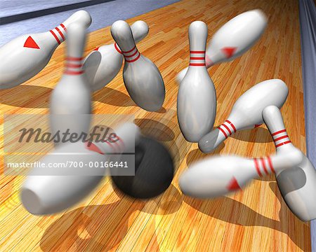 Boule de bowling frappant des Pins