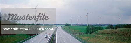 Highway and Wind Turbines in Stormy Weather