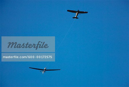 Glider Being Towed by Airplane