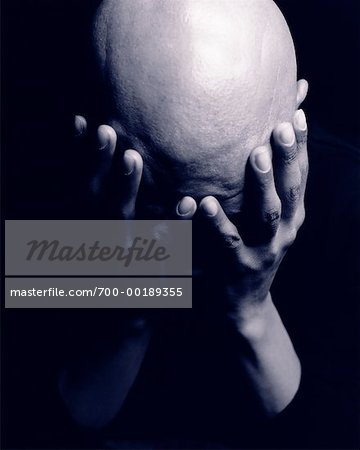 Man With Head in Hands