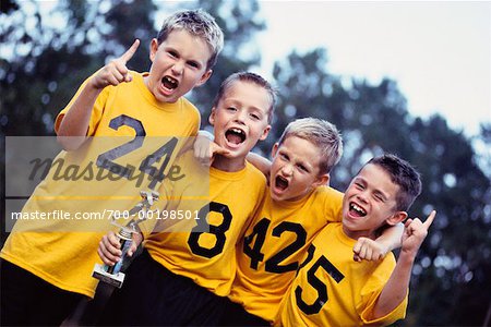 Four Boys with Trophy Yelling