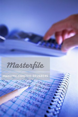 Ledger Book, Pencil, Calculator, And Hand