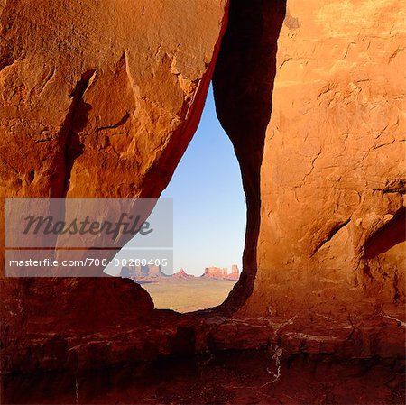 Monument Valley through Gap in Rock Face Arizona USA